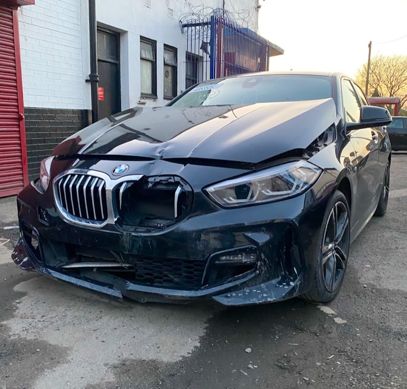 Collision damage repair at Bespoke Autocare in Leeds, a black BMW brought in for body repair